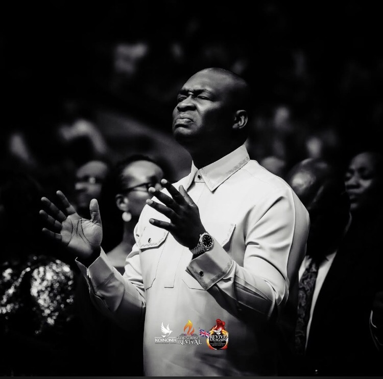 a capture of Apostle Joshua Selman worshipping