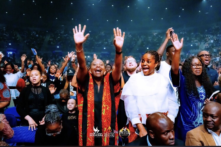 Thanking God with lifted hands