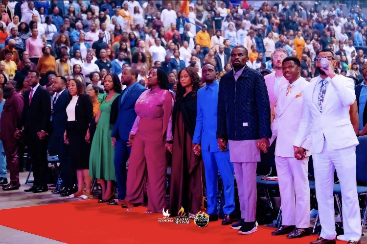 Ministers stood listening