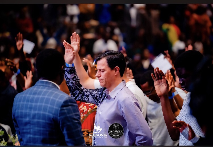 People stood in Worship