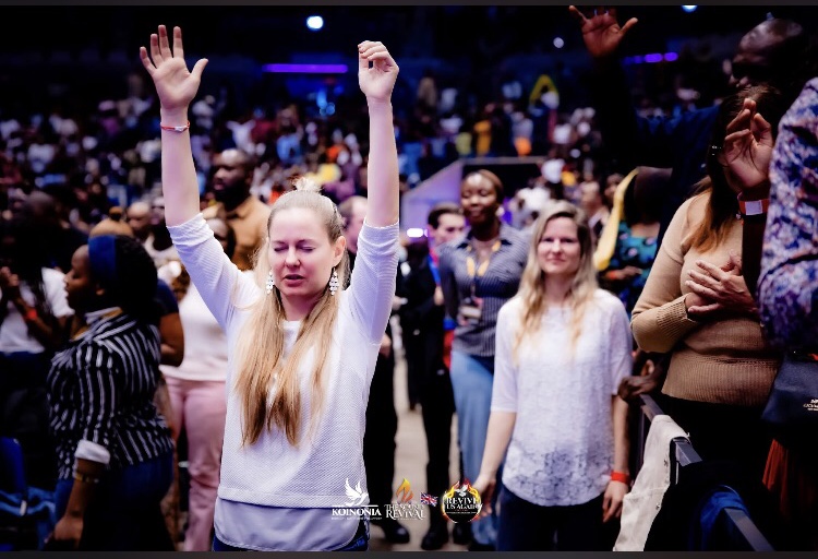 People surrender to Jesus